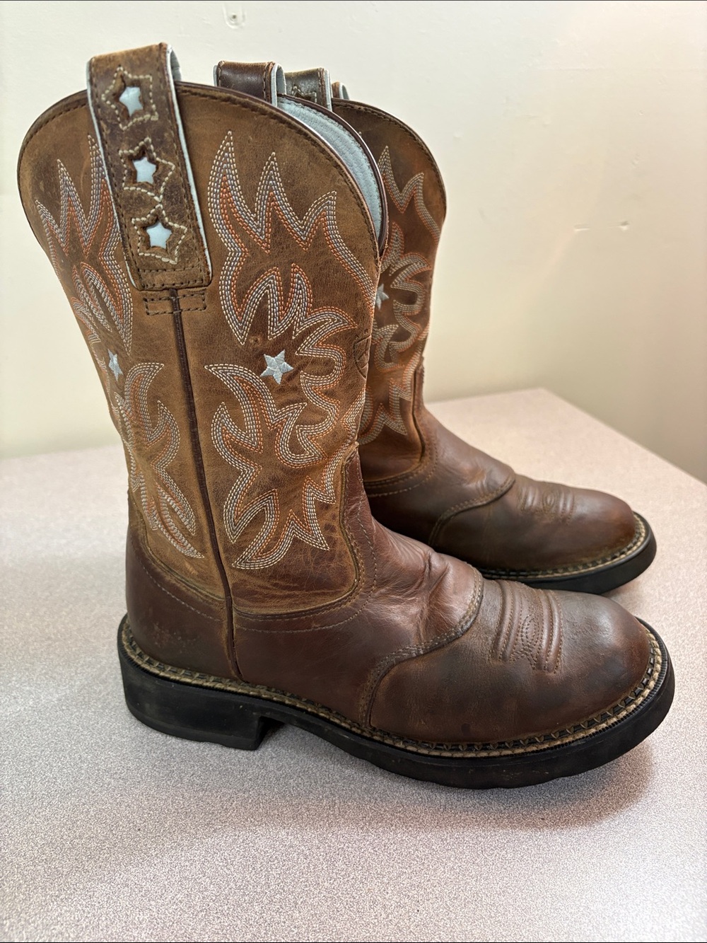 Ariat Brown Leather Western Boots with Light Blue Star Stitching